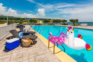 Relax by the pool with ocean views and lounge in style.