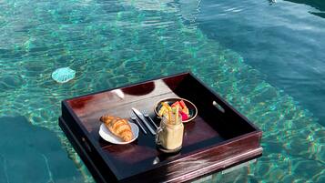 Dagelijks à-la-carte-ontbijt (USD 5 per persoon)