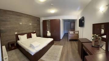 Habitación familiar | Ropa de cama de alta calidad y decoración personalizada