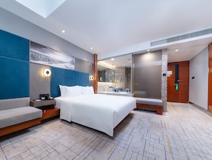 Standard Double Room | Minibar, in-room safe, desk, blackout drapes