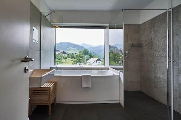 Deluxe Suite, Non Smoking, Hill View | Bathroom | Free toiletries, hair dryer, slippers, towels