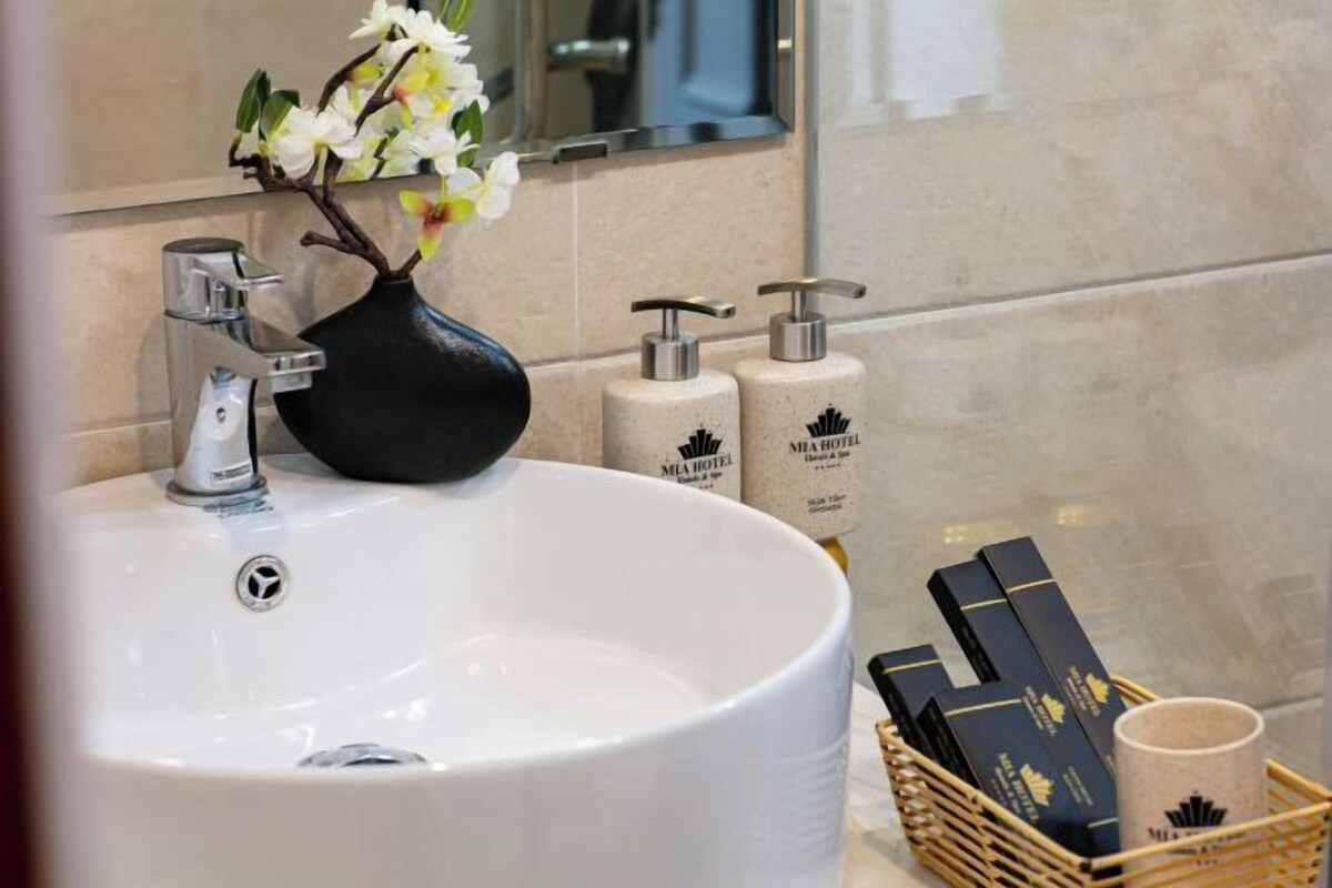Rainfall showerhead, designer toiletries, hair dryer, bathrobes