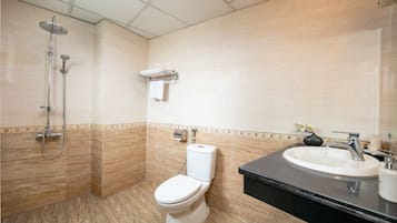 Combined shower/tub, hair dryer, slippers, bidet