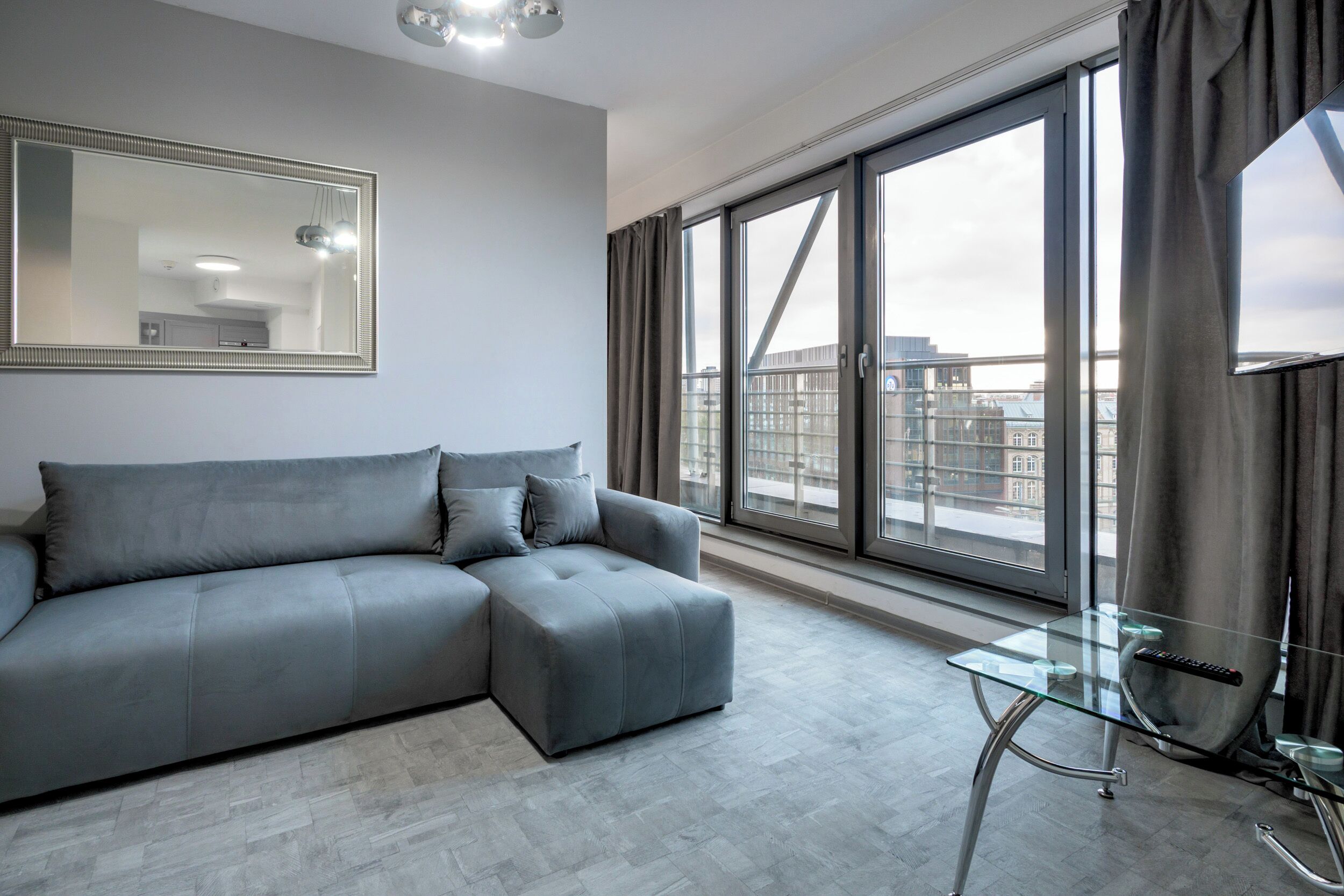 Design Apartment | Living room | 37-inch flat-screen TV with digital channels