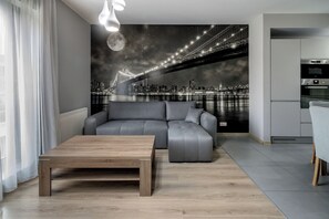 コンフォート アパートメント クイーンベッド 1 台ソファーベッド付き | リビングルーム | 37 インチの薄型テレビ (デジタル放送視聴可)