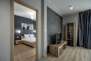 Apartemen Comfort, 1 Tempat Tidur Queen dengan tempat tidur Sofa | Area keluarga | Televisi layar datar 37-inci dengan saluran TV digital