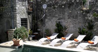 Sermoneta, Historic Stone Village House with Pool, in a Medieval Hill Town Close to Rome and Naples