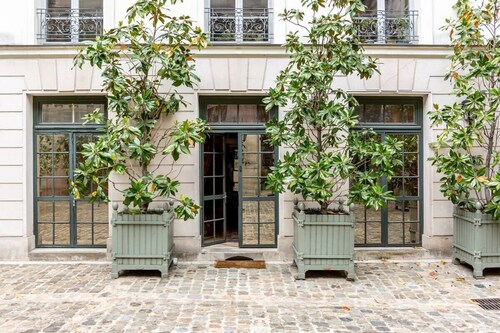 Vivaldi, In Paris' Marais, in Historic Palace, Artfully Restored large apartment