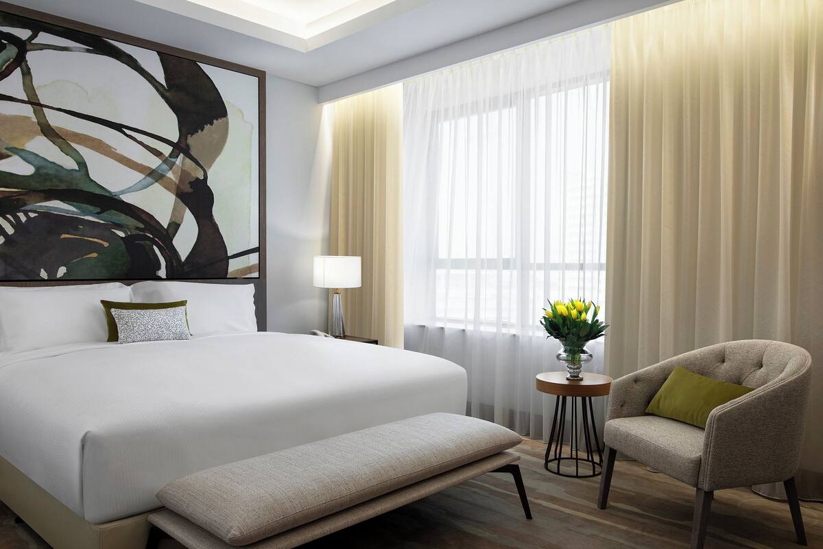 Premium bedding, down duvets, in-room safe, desk