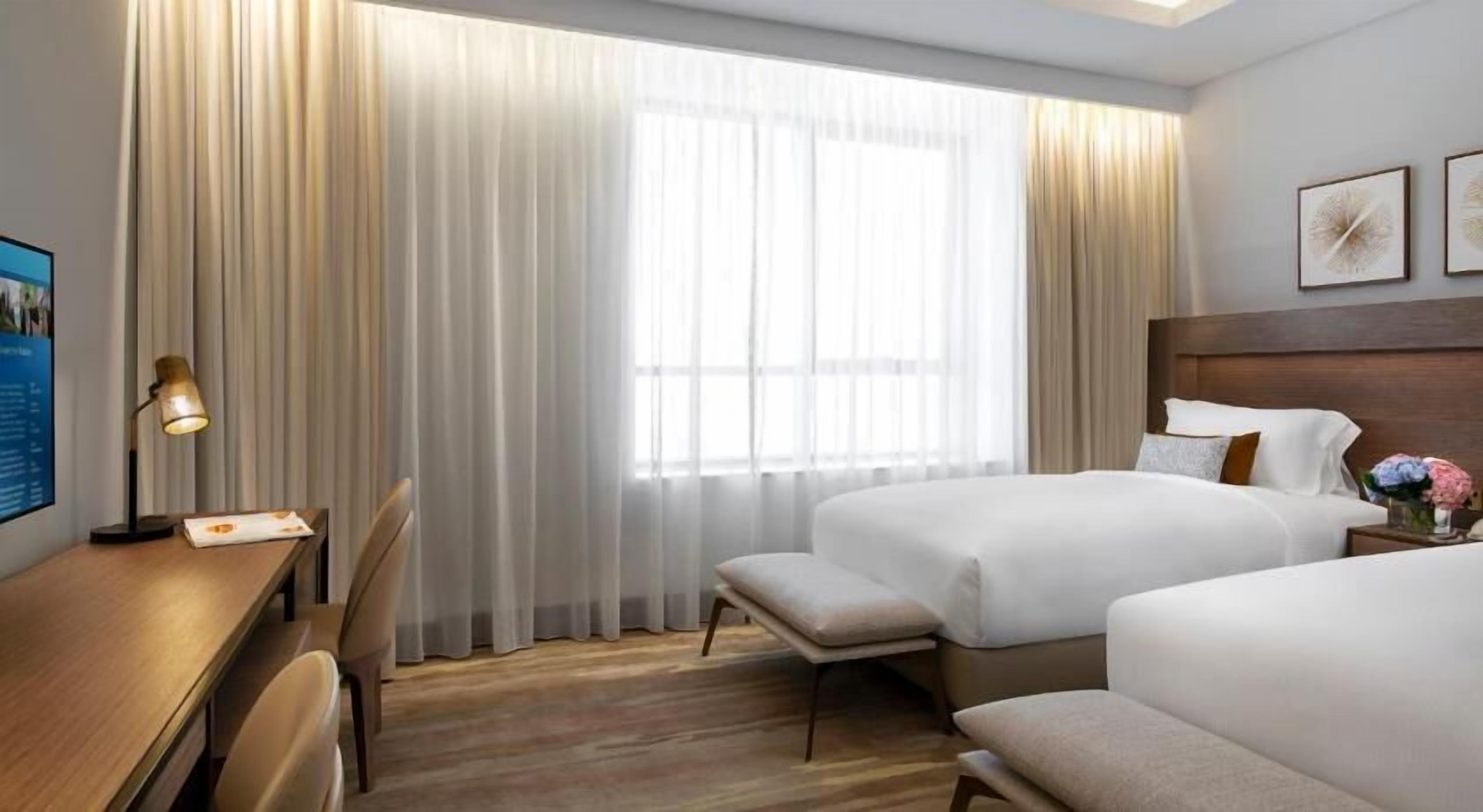 Premium bedding, down duvets, desk, blackout curtains