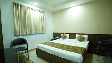 Standard A/C room | Free WiFi, bed sheets