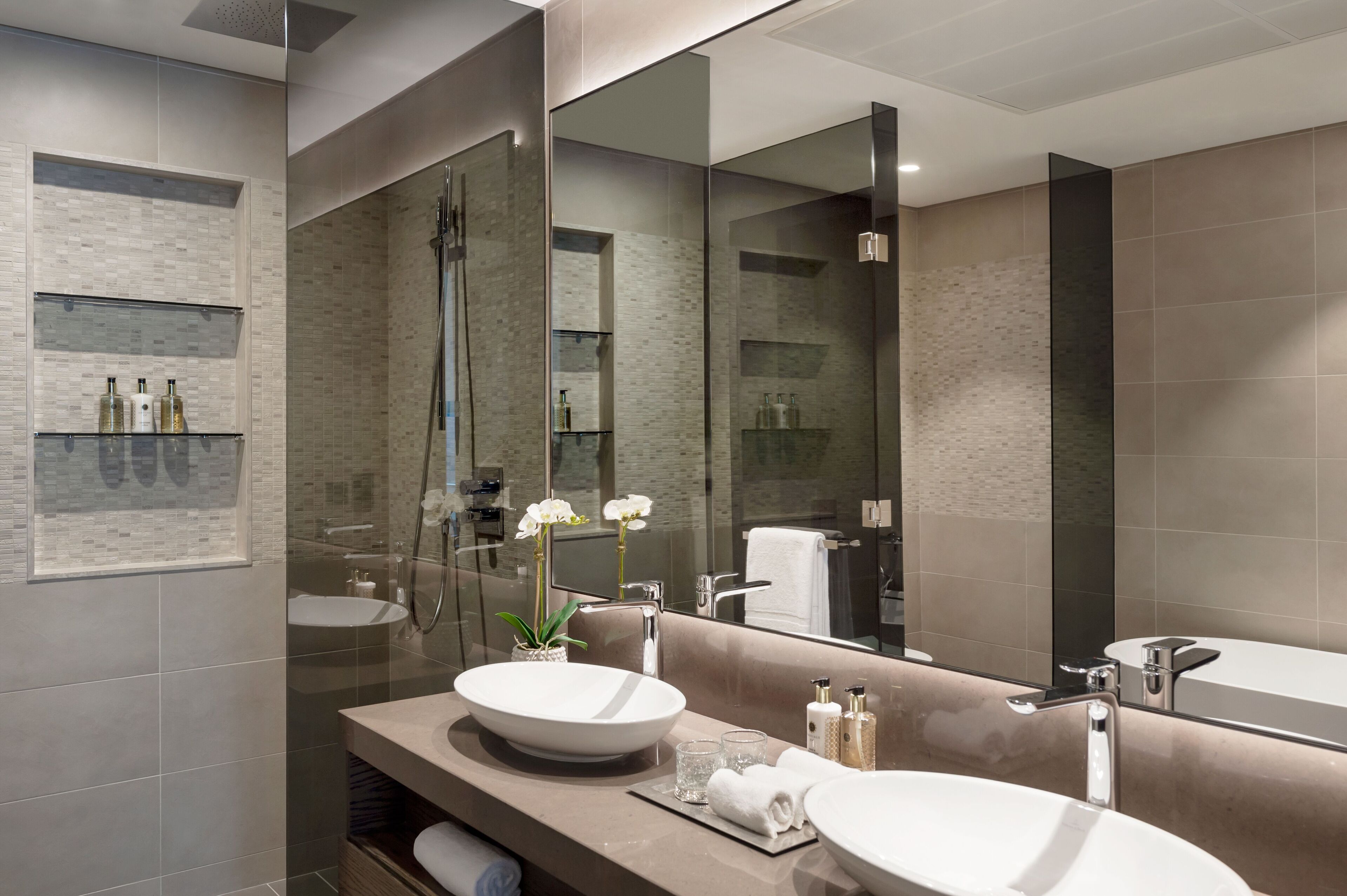 deluxe suite, 1 bedroom | bathroom | designer toiletries, hair dryer, bathrobes, slippers