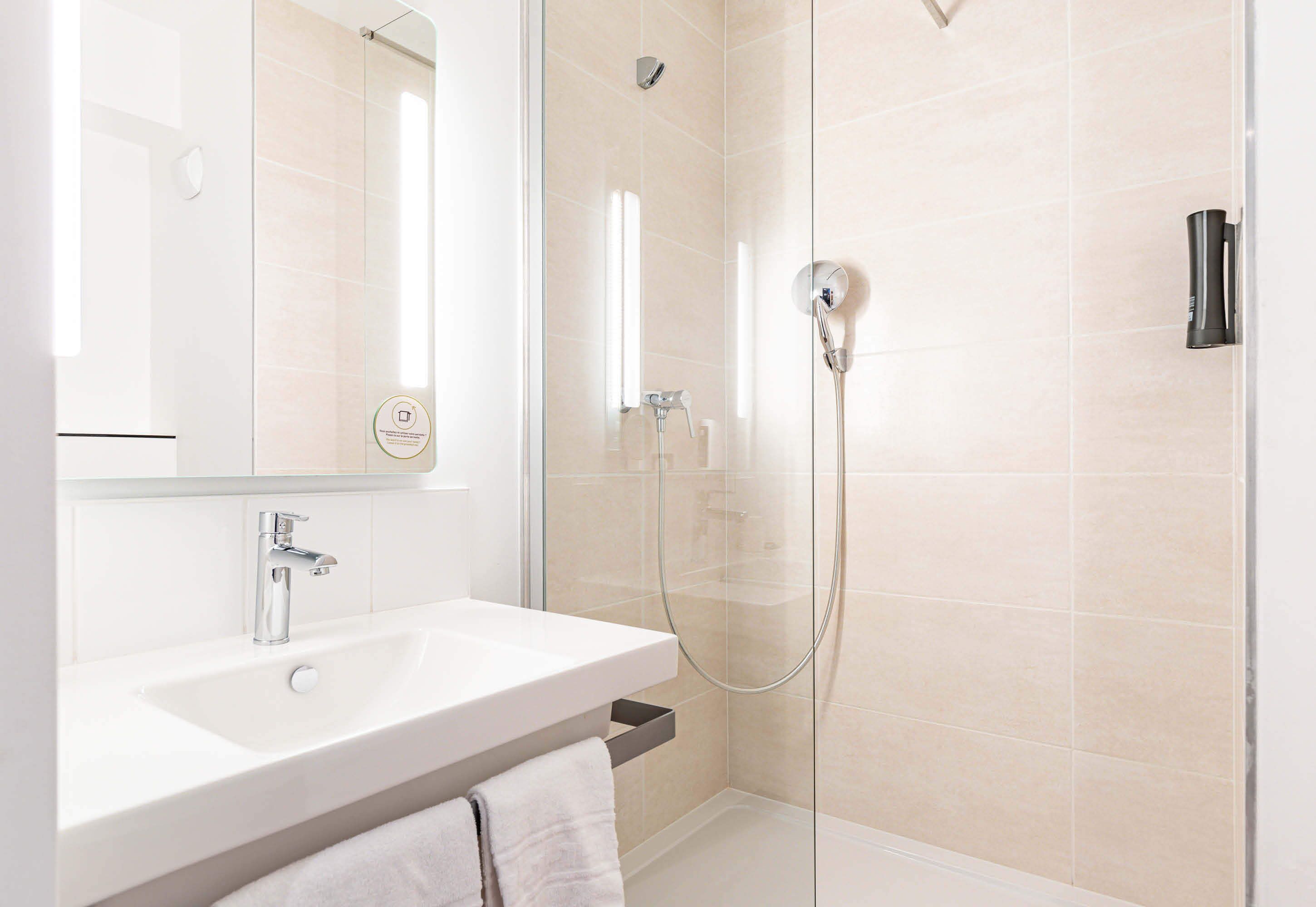 shower, towels, soap, shampoo