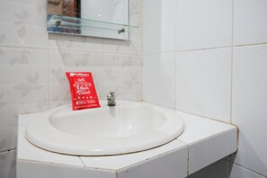 Ducha, artículos de tocador gratuitos, toallas