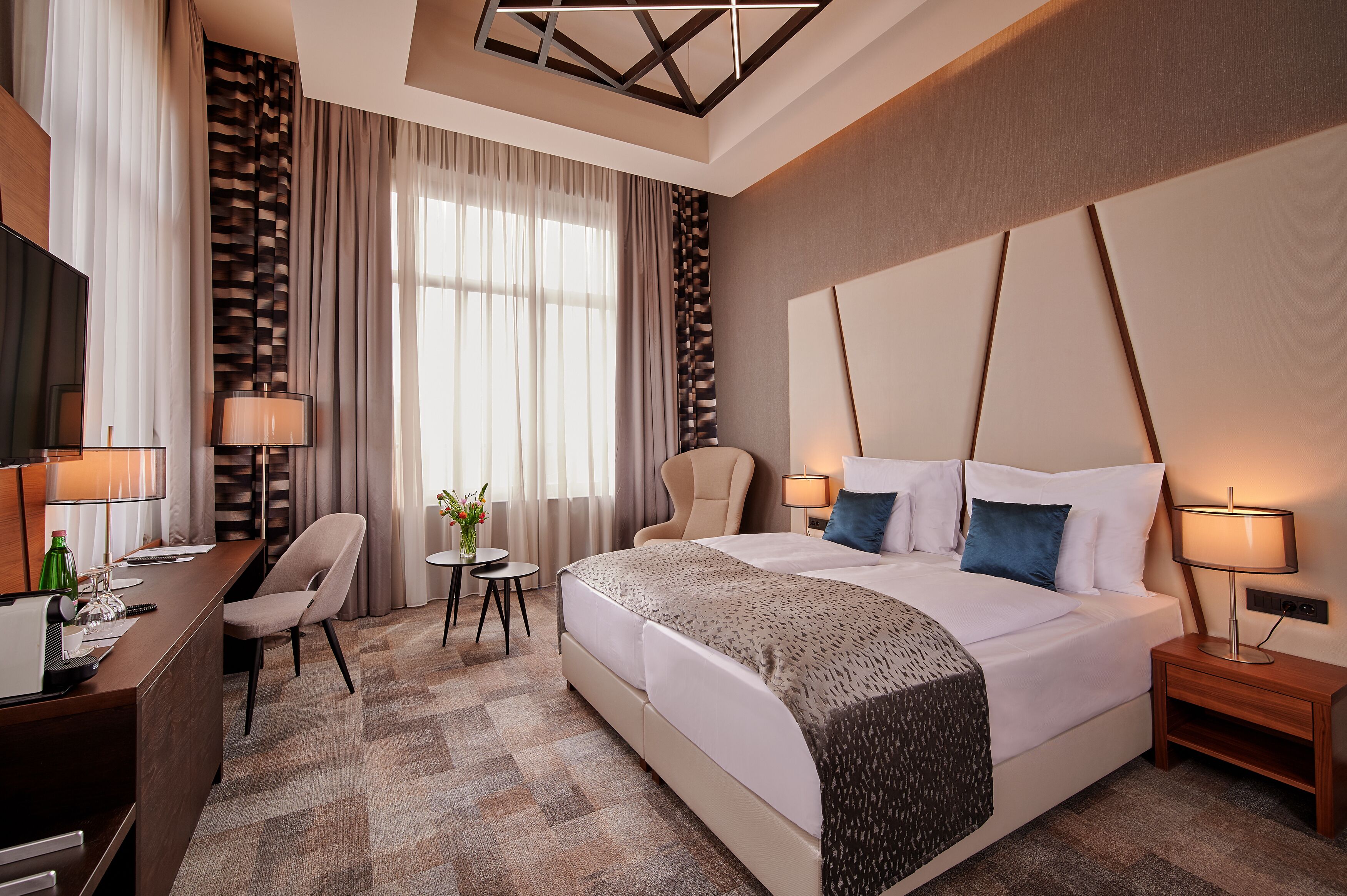 Dobbelt- eller tomannsrom – superior | Allergitestet sengetøy, minibar, safe på rommet og skrivebord