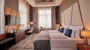 Hypo-allergenic bedding, minibar, in-room safe, desk