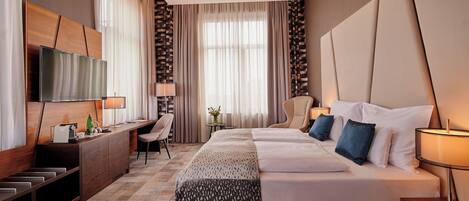 Literie hypoallergénique, minibar, coffres-forts dans les chambres