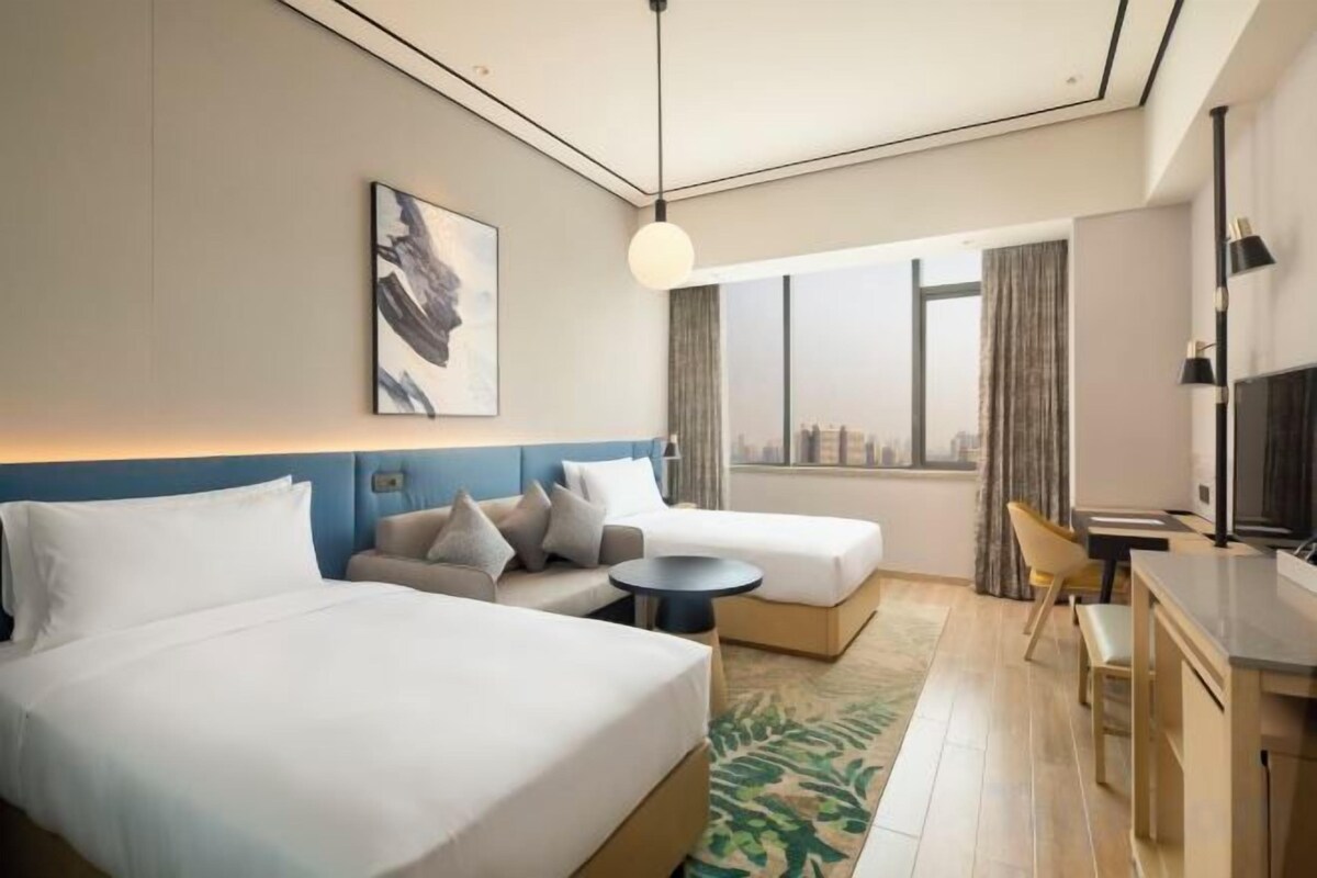 Premium bedding, down duvets, in-room safe, desk