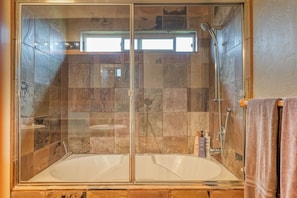 Combined shower/tub, hair dryer, towels, soap