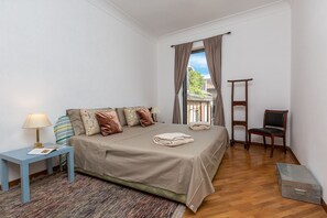 1 bedroom, desk, iron/ironing board, travel cot