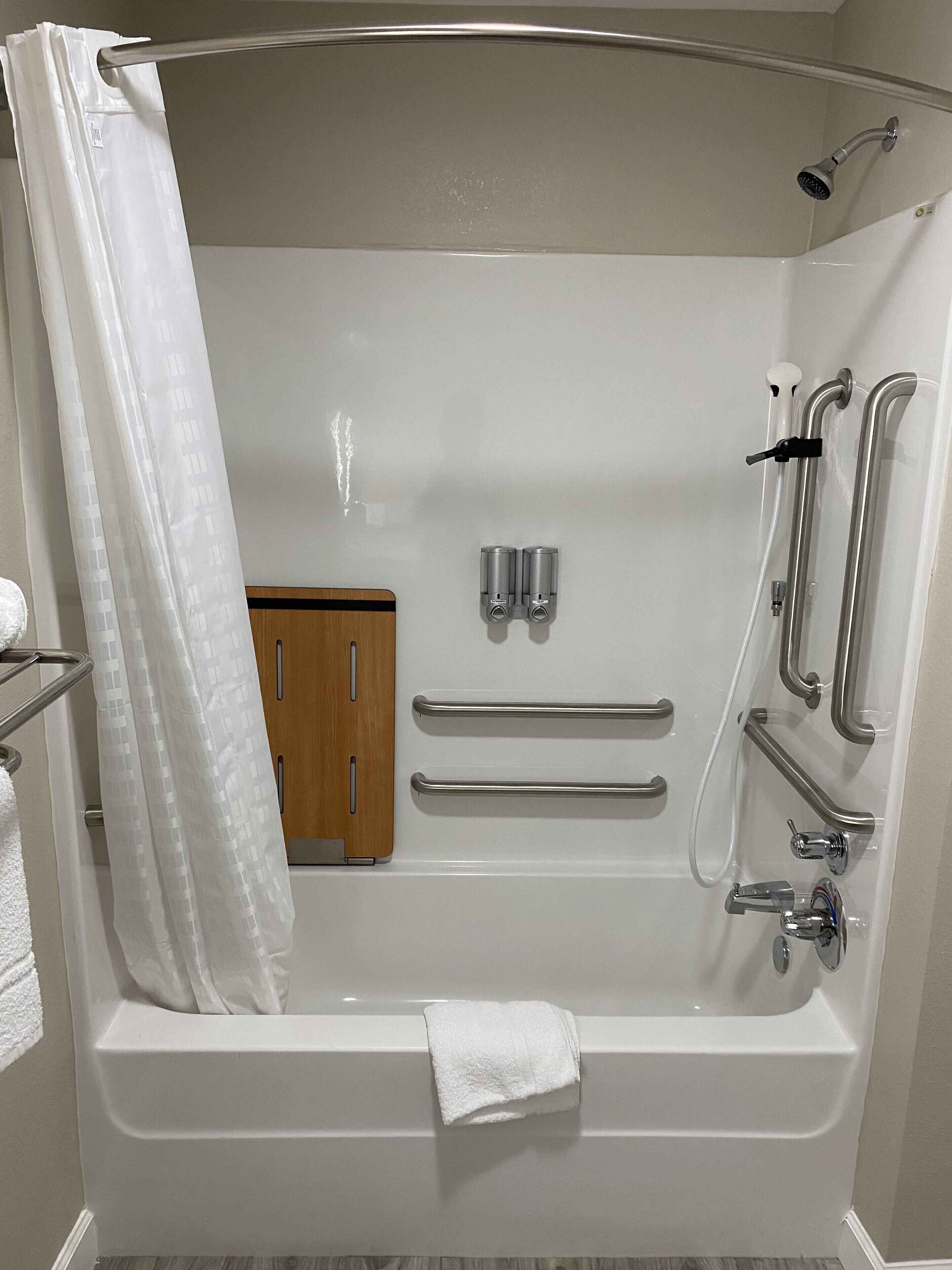 combined shower/bathtub, free toiletries, hair dryer, towels