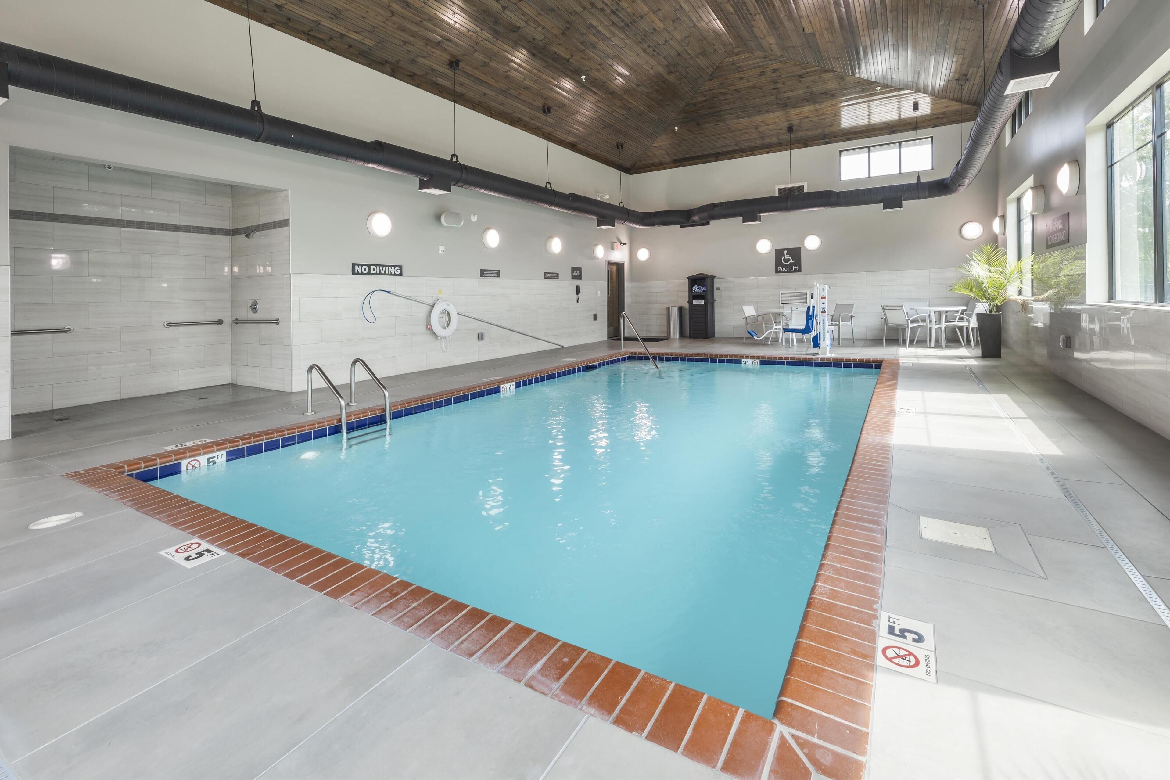 indoor pool, open 8:00 am to 10:00 pm, pool loungers