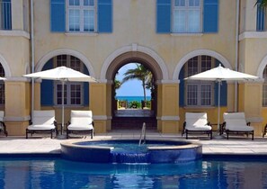 Outdoor pool, pool loungers - 2nd Floor BeachFront Condo
205 Villa Renaissance Grace Bay (Grace Bay)