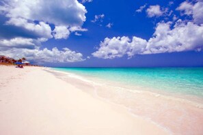 On the beach, sun loungers, beach towels - Villa Renaissance  Unit 501 1BR Pool/Garden (Grace Bay)