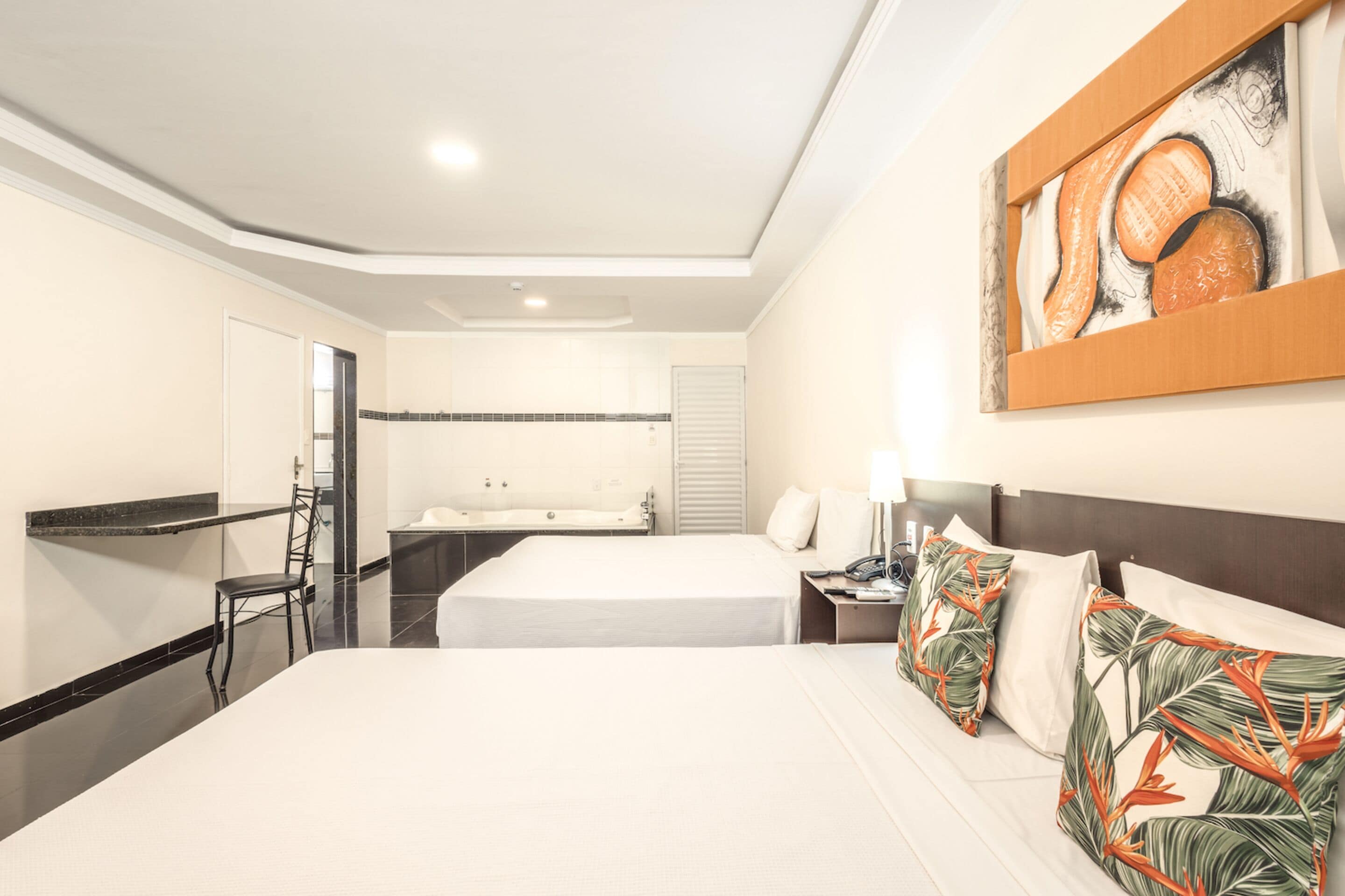 superior quadruple room, jetted tub | minibar, laptop workspace, blackout curtains, free wifi