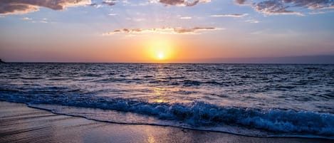 On the beach, sun-loungers, beach towels