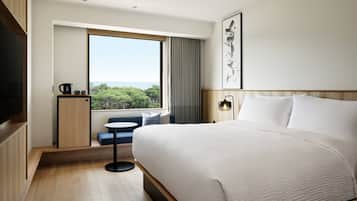 Standard Room, 1 King Bed | Down comforters, in-room safe, desk, blackout drapes