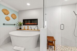 Combined shower/tub, hair dryer, towels, soap