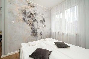 1 habitación, tabla de planchar con plancha, wifi y ropa de cama 