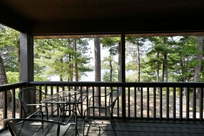 Outdoor dining - All 4 lakefront condos! Private beach, dock, sauna, club room, decks. (Webb Lake)