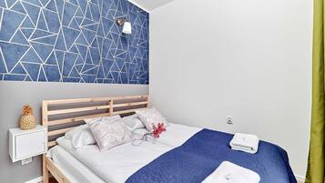 1 slaapkamer, een strijkplank/strijkijzer, wifi, beddengoed