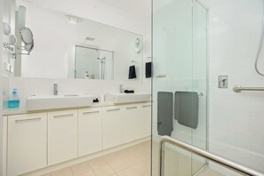 Shower, hair dryer, towels