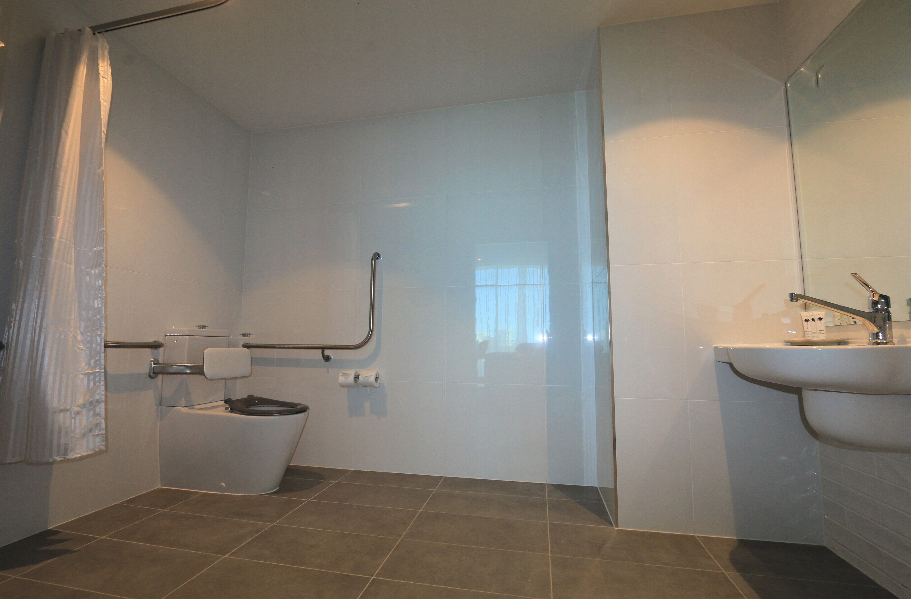 room (accessible) | bathroom | shower, free toiletries, hair dryer, towels