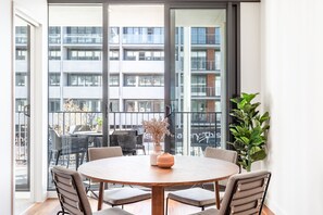 Two Bedroom Apartment With Parking | Living room | 49-inch Smart TV with digital channels, TV