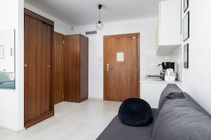 Studio, balcon, en bord de plage | Coin séjour