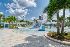 Outdoor pool, a heated pool, pool umbrellas, pool loungers