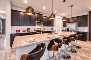 Full-sized fridge, microwave, oven, stovetop - Elegant Brand New 9 Bedrooms House With Private Pool at Solara Resort (8929) (Kissimmee)