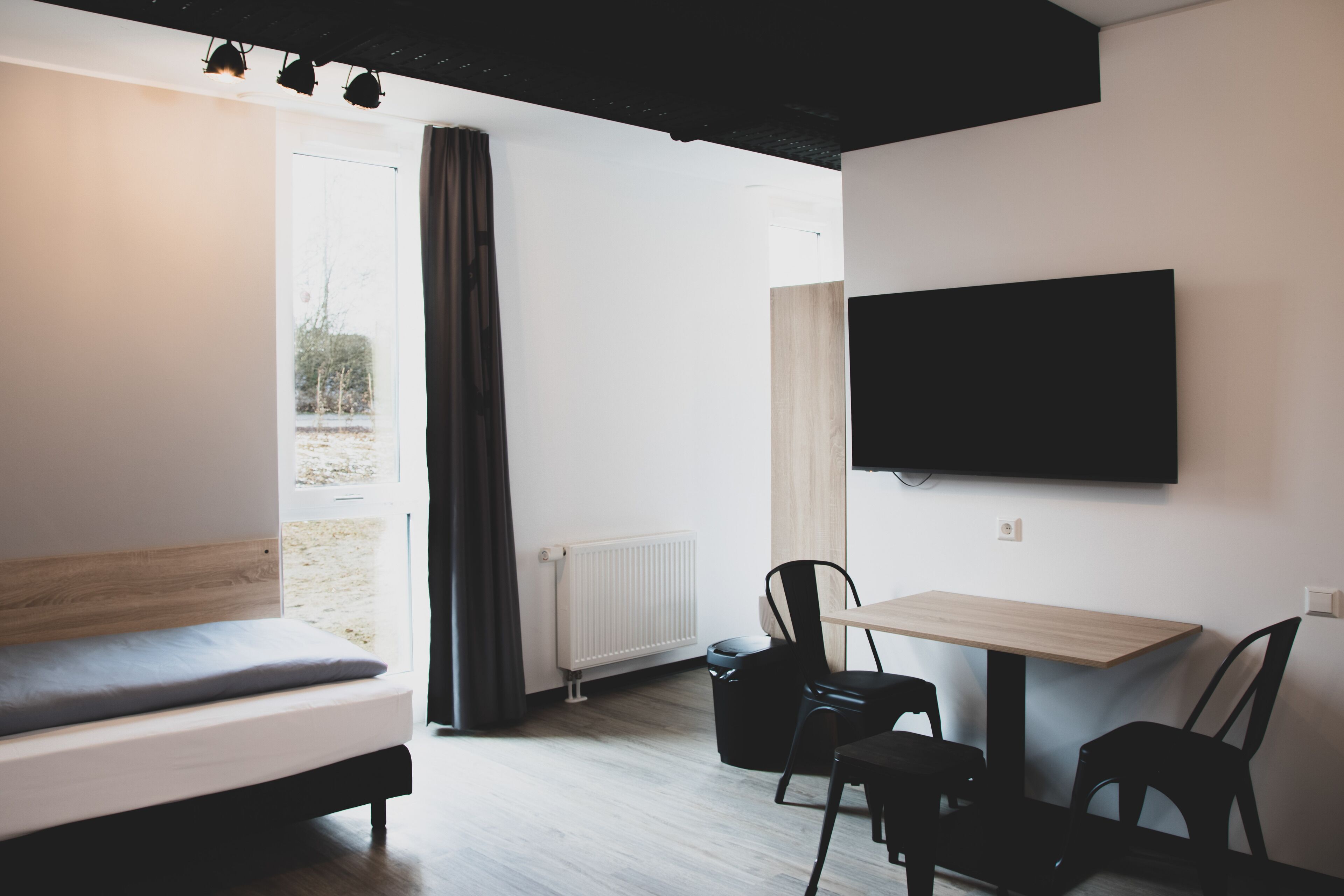 Dreibettzimmer | Allergikerbettwaren, Verdunkelungsvorhänge, kostenloses WLAN, Bettwäsche