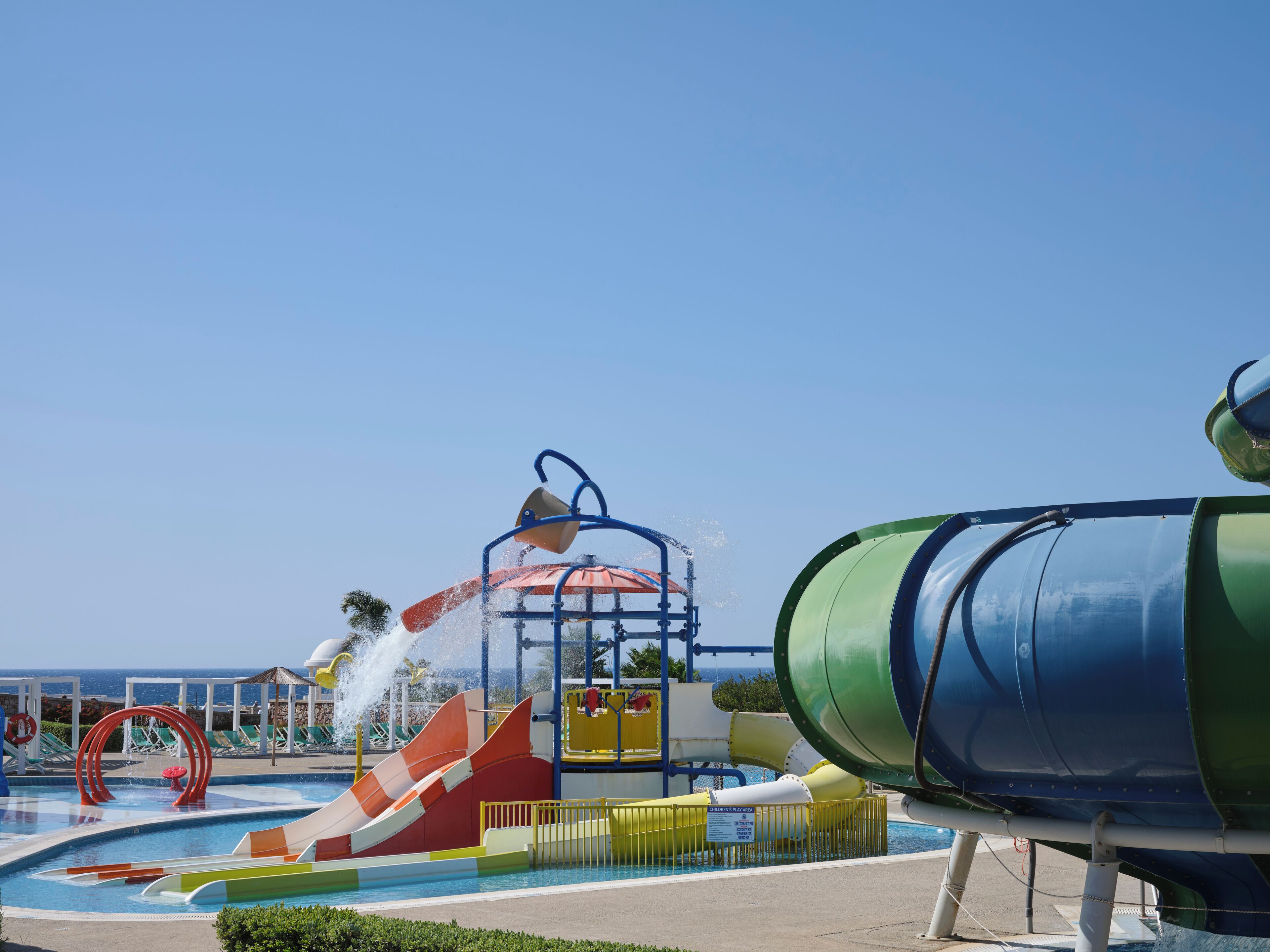 A water park with slides and a pool.