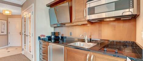 Fridge, microwave, stovetop, coffee/tea maker