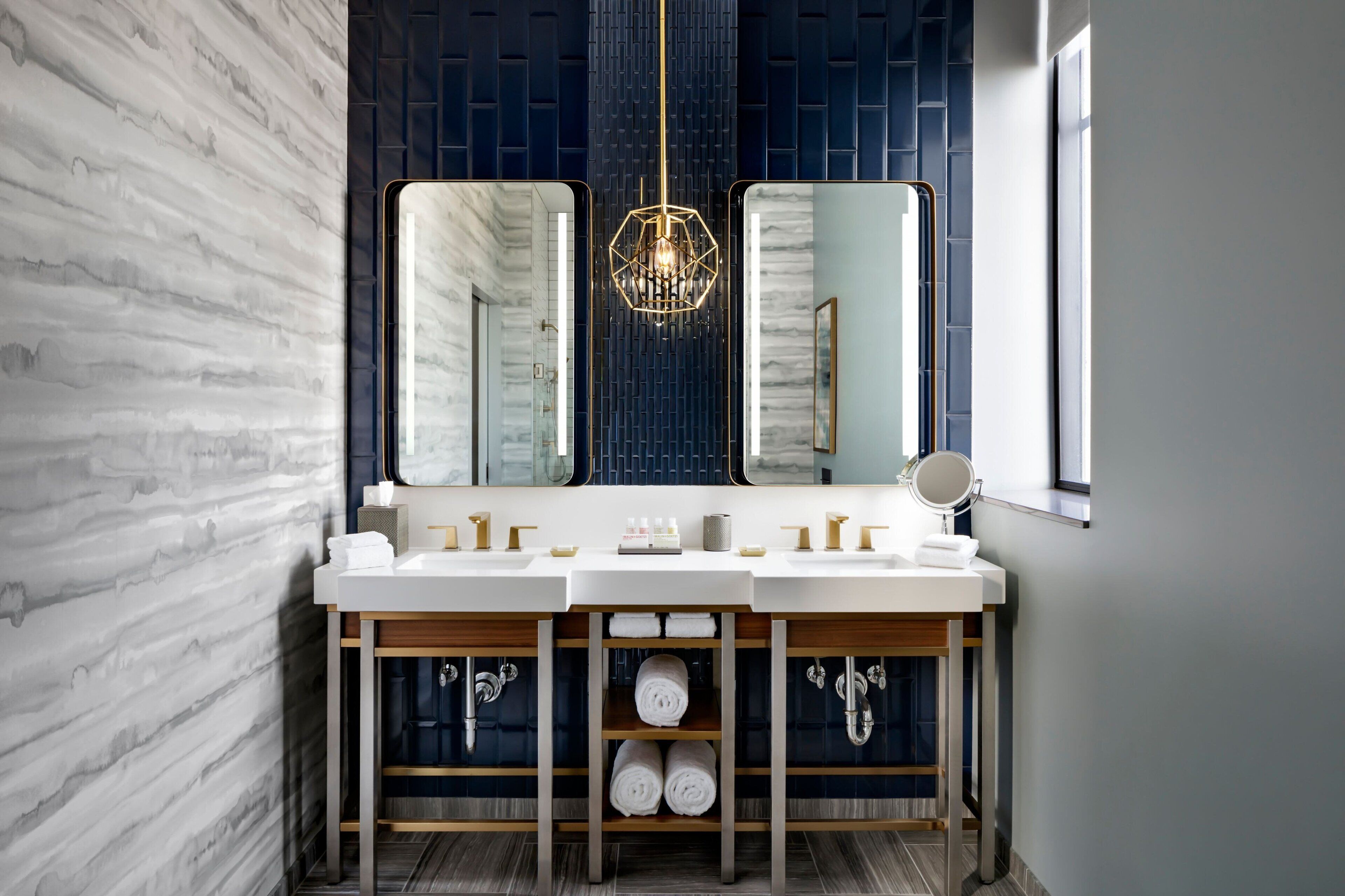 suite, 1 king bed with sofa bed | bathroom | designer toiletries, hair dryer, bathrobes, towels