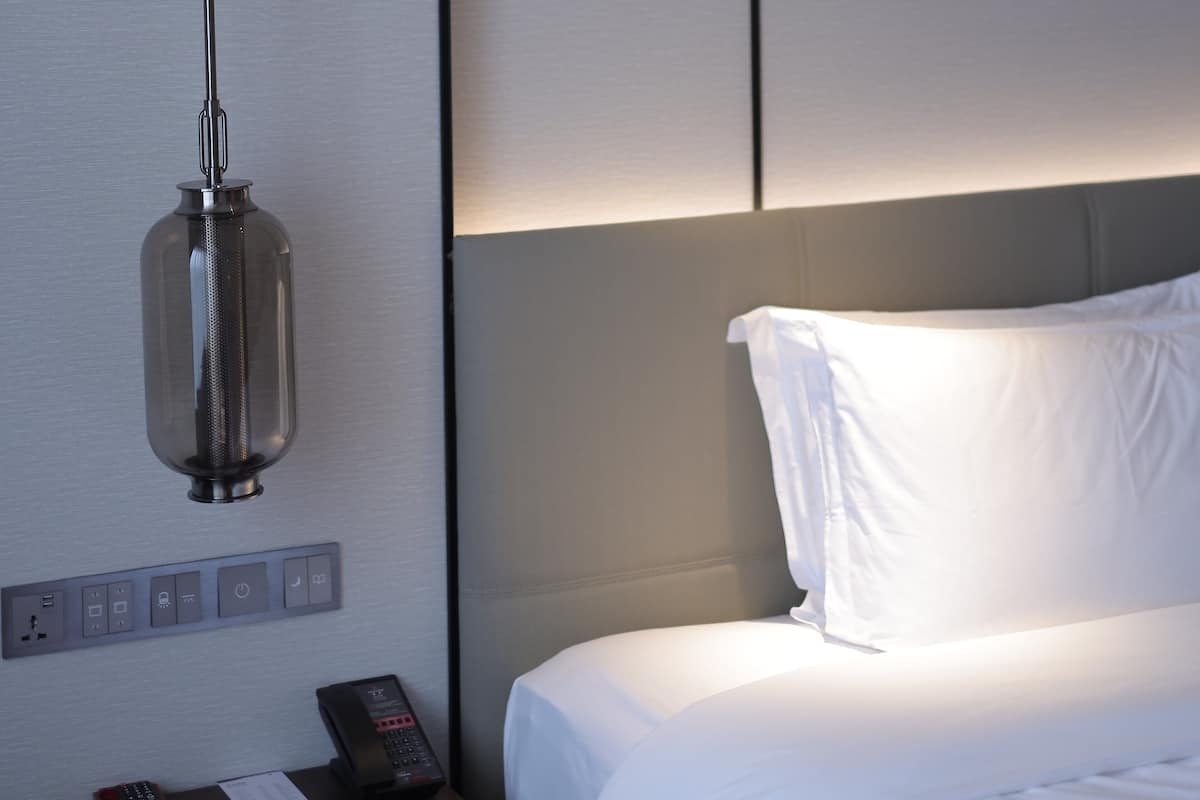 Premium bedding, down comforters, memory foam beds, in-room safe