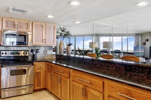 Fridge, microwave, oven, stovetop - Sandpiper Condominiums 806, Panoramic Gulf Views w/ direct access to Mustang Island/Port A beaches. (Port Aransas)