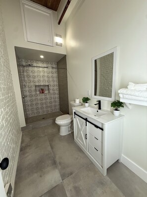 Hair dryer, towels, soap, shampoo