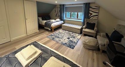 Lovely 7 bedroom home with hot tub and large garden near Oban