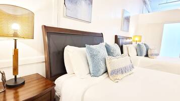 Iron/ironing board, travel crib, free WiFi, bed sheets